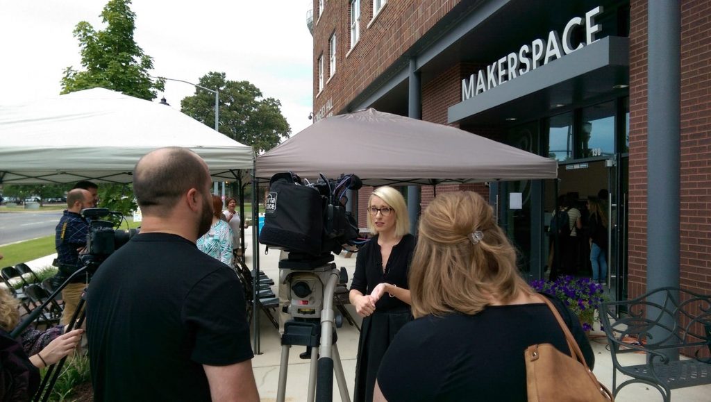 Kim Lane visits with the media about the launch of the Makerspace